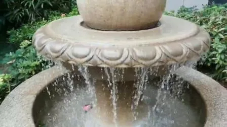 Fontaine d'eau flottante en boule de granit